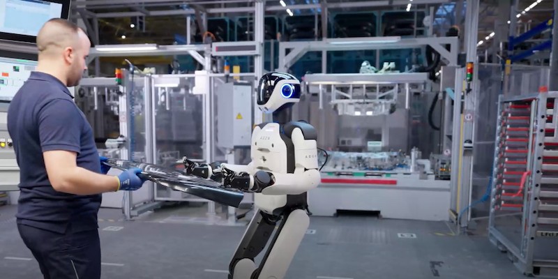 Robotics engineer standing in a professional automation laboratory