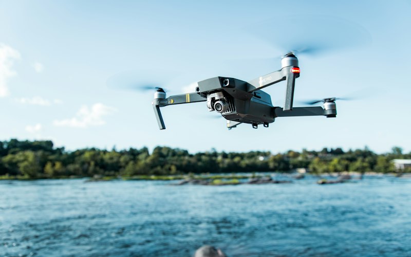 Autonomous quadcopter drone flying over water